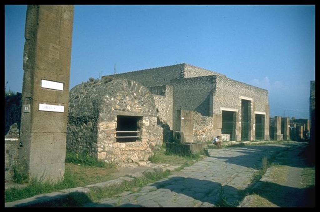VI.1.19  Pompeii.  Well, fountain and House of Sallust. Looking south on Via Consolare.  Photographed 1970-79 by Gnther Einhorn, picture courtesy of his son Ralf Einhorn.
