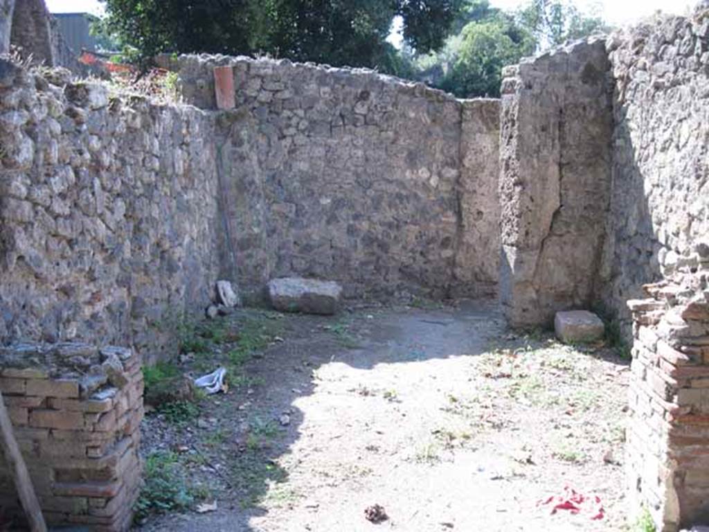 I.1.10 Pompeii. September 2010. Looking west towards room with doorway leading to I.1.1, from entrance room. Photo courtesy of Drew Baker.
