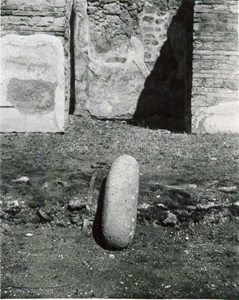I.2.3 Pompeii. 1935 photo by Tatiana Warscher. Looking north across atrium, towards doorway to the tablinum (room e). A long projectile had been found in this house.
See Warscher T., 1935. Codex Topographicus Pompeianus: Regio I.2. (no.5), Rome: DAIR, whose copyright it remains.   

