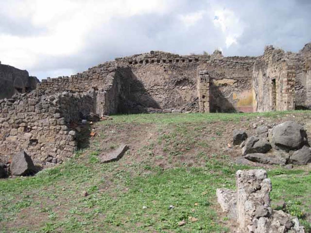 1.2.3 Pompeii. September 2010. Looking north towards remains of north wall (right or north-eastern corner of atrium). The north wall of house at I.2.6 is visible at the rear. Photo courtesy of Drew Baker.
