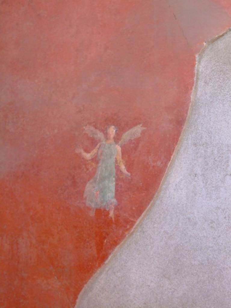 I.6.4 Pompeii. March 2009. Room 5, east wall, painted flying figure at north end.