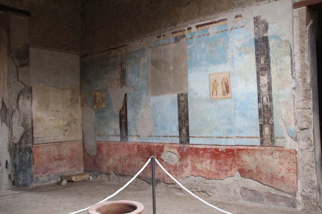 I.6.11 Pompeii. April 2014. Looking towards north-east corner of atrium with theatrical paintings. Photo courtesy of Klaus Heese.