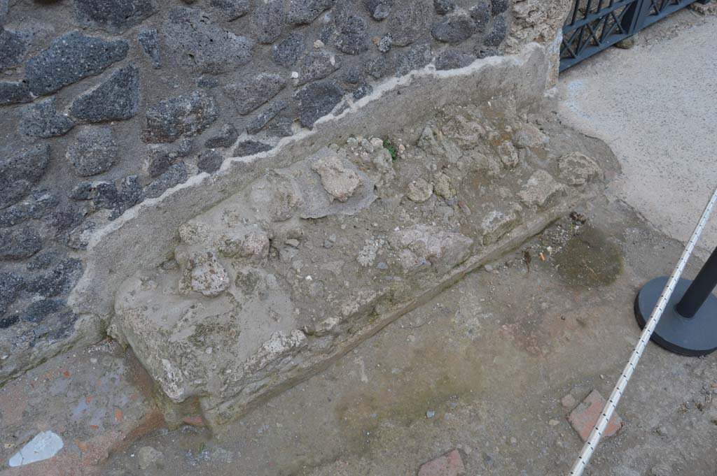 I.8.17 Pompeii. March 2019. Detail of bench outside of entrance doorway.
Foto Taylor Lauritsen, ERC Grant 681269 DCOR.
