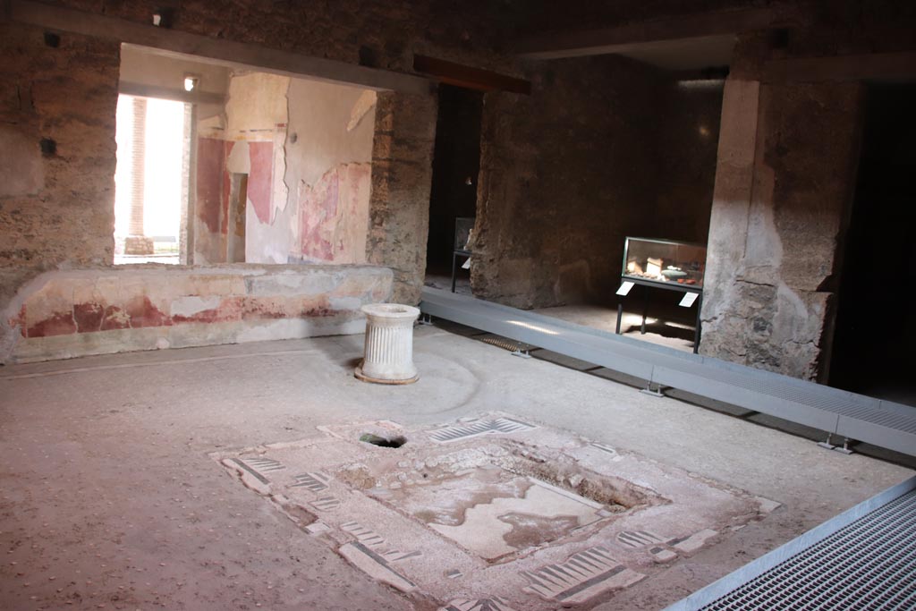 I.9.14 Pompeii. October 2022. Room 8, looking north-east across impluvium in atrium towards room 10. Photo courtesy of Klaus Heese.
