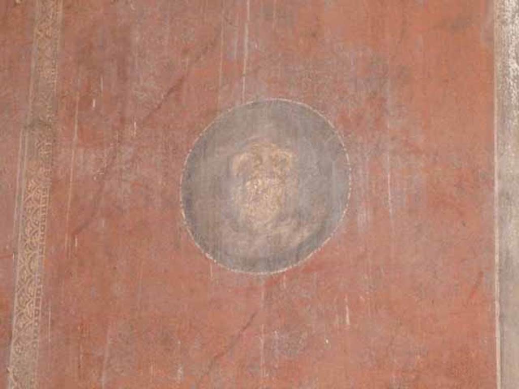I.10.4 Pompeii. May 2010. East wall in north-east corner of atrium. Painted medallion.
