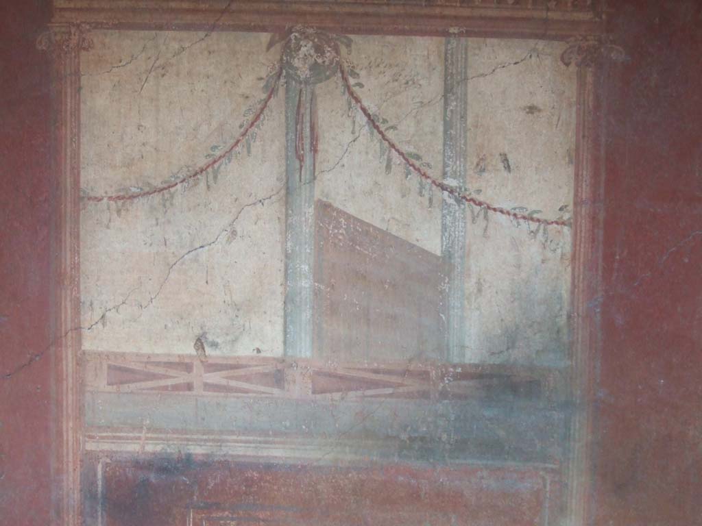 I.10.4 Pompeii. May 2006. Room 4, east wall, detail from wall below centre painting.