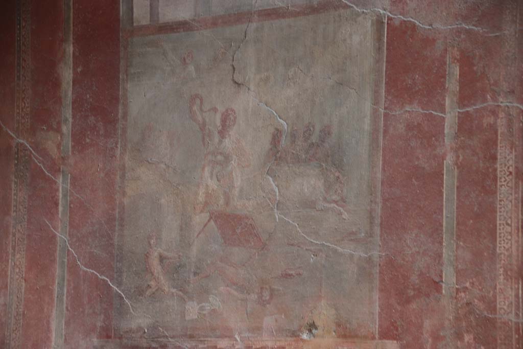 I.10.4 Pompeii. September 2021. 
Room 4, south wall with central wall painting of the Death of Laocoon. Photo courtesy of Klaus Heese.
