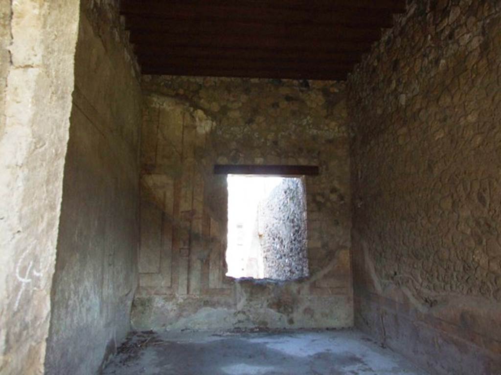 I.12.2 and I.12.1 Pompeii. March 2009. Room 7, triclinium. North wall with window.