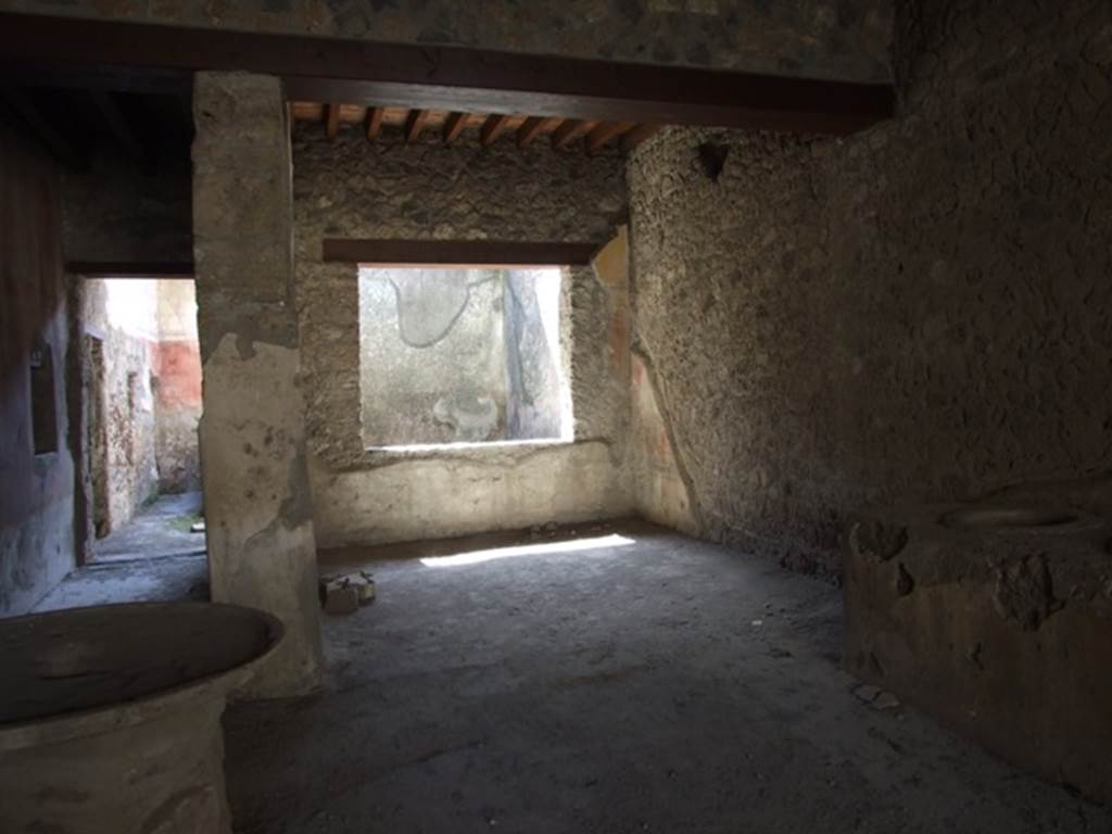 I.12.3 Pompeii. March 2009. Room 1, looking south-west to room 3 the windowed triclinium, from caupona courtyard.