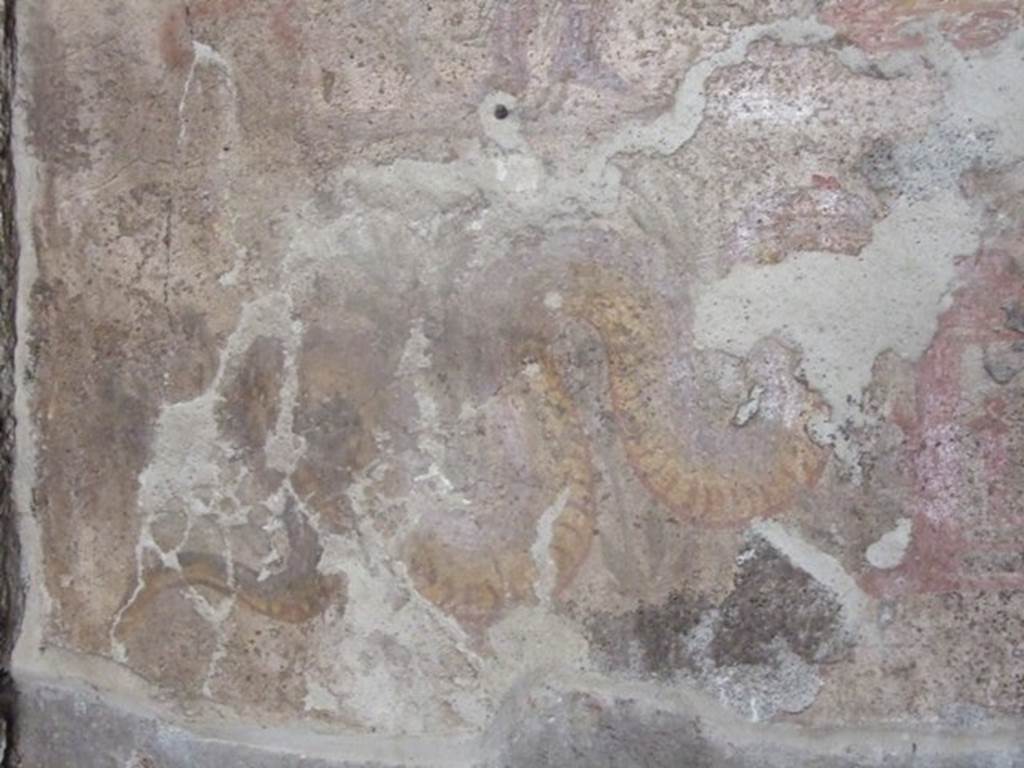 I.12.3 Pompeii.  March 2009.  Room 4.  Lararium.  Detail of  one serpent.