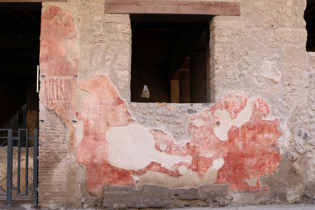 I.12.3 Pompeii. December 2018. Graffiti and plaster on wall to west of door. Photo courtesy of Aude Durand.