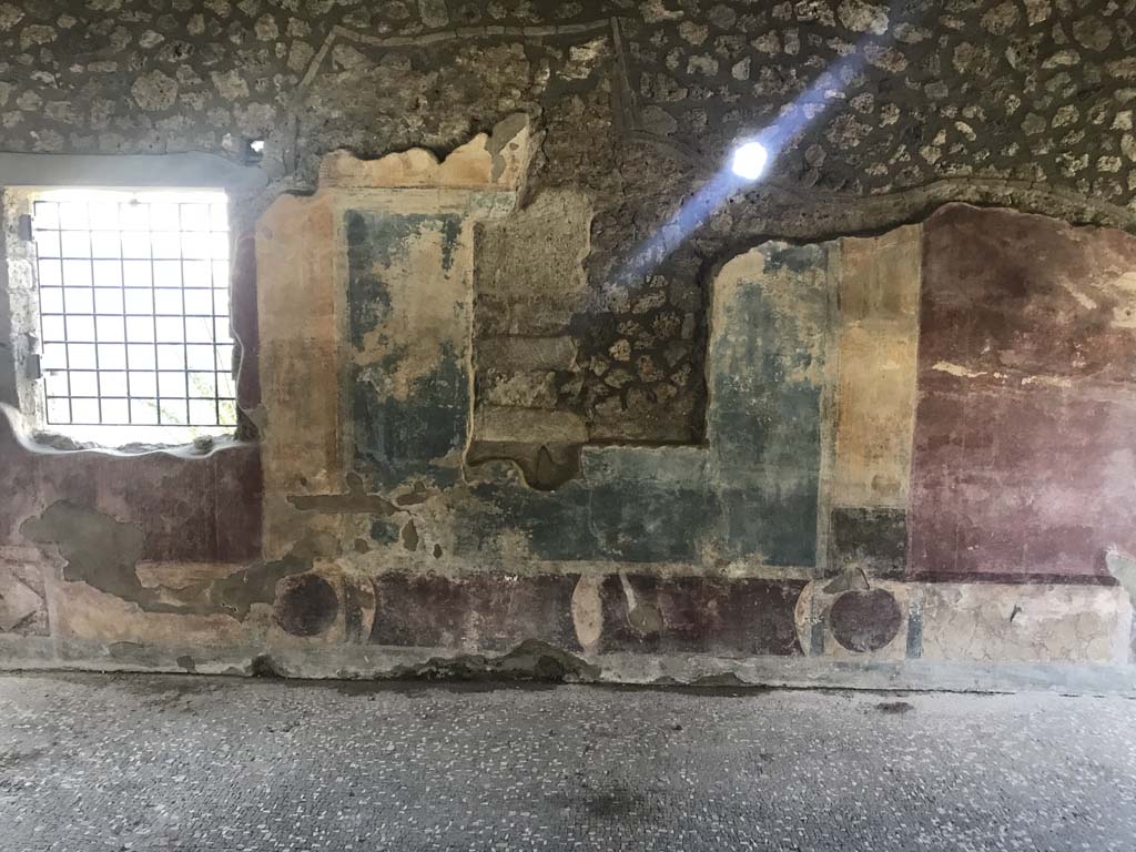 II.4.3 Pompeii. April 2019. Looking towards west wall of atrium. Photo courtesy of Rick Bauer.
Above the south end of the blue panel, a part of the Forum Frieze can still be seen.
