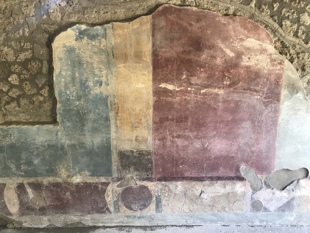II.4.3 Pompeii. April 2019. Detail of painted decoration on west wall of atrium. 
Photo courtesy of Rick Bauer.
