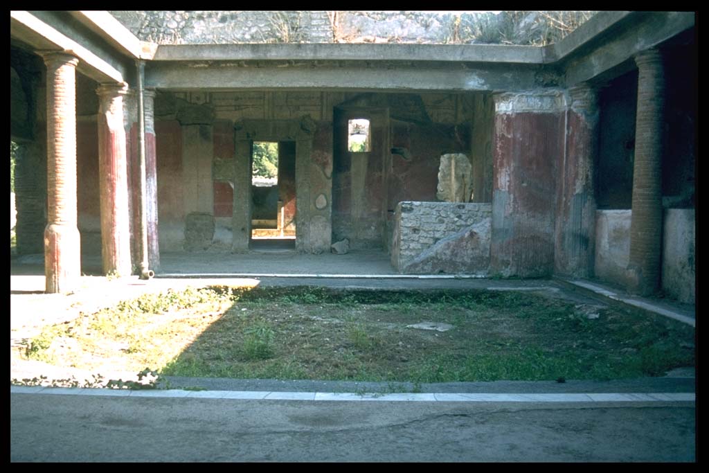 II.4.6 Pompeii. Looking south across portico of the baths.
Photographed 1970-79 by Günther Einhorn, picture courtesy of his son Ralf Einhorn.
