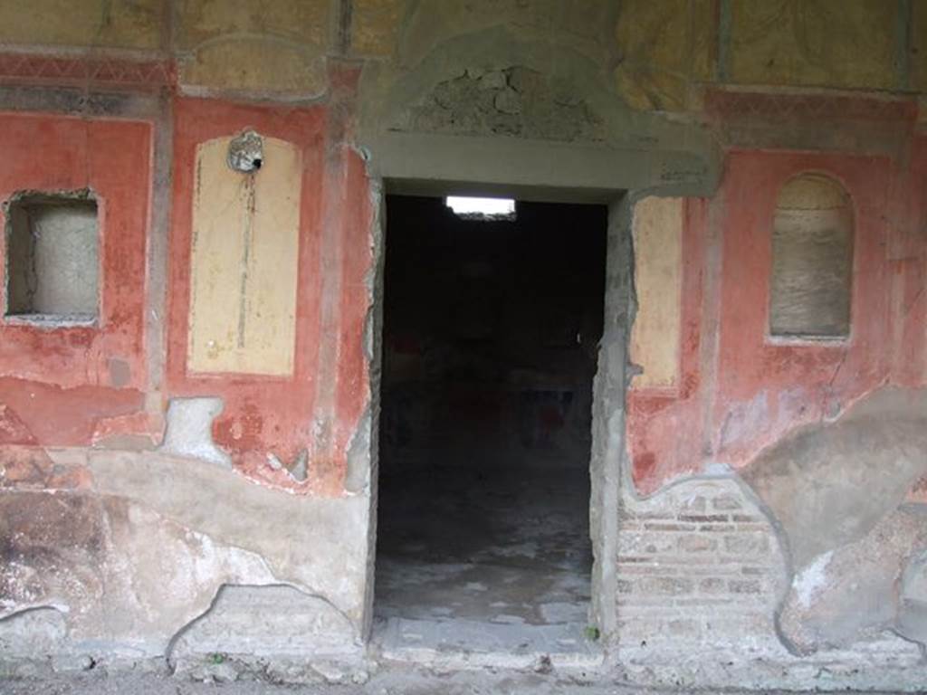 II.4.6 Pompeii. December 2006.  Room to north of summer Triclinium, and wall decoration in portico