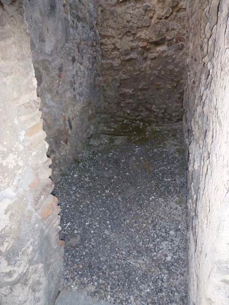 V.3.8 Pompeii. June 2012. Doorway to narrow room on west side of entrance corridor.
Photo courtesy of Michael Binns.
