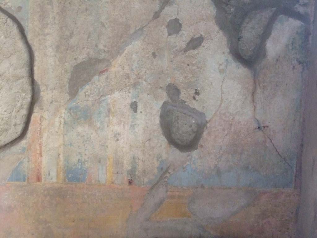 VI.1.7 Pompeii. December 2007. Room 19, remains of painted plaster on east wall.