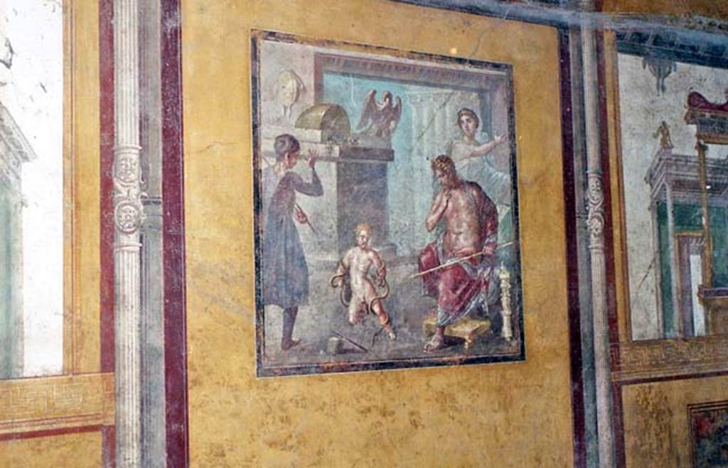 VI.15.1 Pompeii. October 2001. North wall of exedra with central wall painting of Hercules strangling the serpents. Photo courtesy of Peter Woods.
