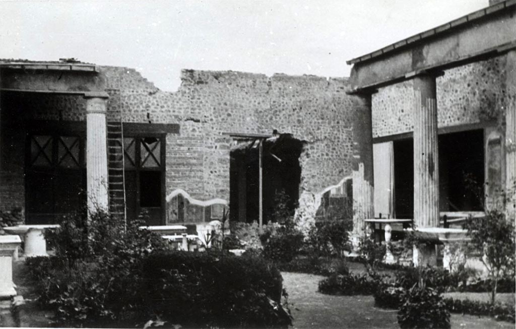 VI.15.1 Pompeii. c.1943-6. War damage in peristyle garden, looking towards north and north-east corner. 
Photo courtesy of British School at Rome Digital Collections.
See http://www.bsrdigitalcollections.it/details.aspx?ID=5608&ST=SS
