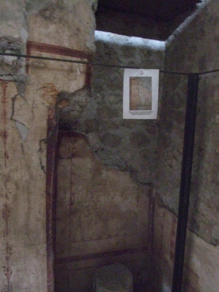 VI.15.1 Pompeii. December 2006. 
Recess in south wall of bedroom (x’), used either by servants or as a private brothel?
The notice indicated the statue of Priapus was away for restoration.
