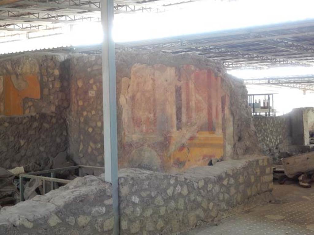 VI.17.41 Pompeii. May 2015. Looking towards west wall of triclinium with painted decoration, on south side of atrium. Photo courtesy of Buzz Ferebee.
