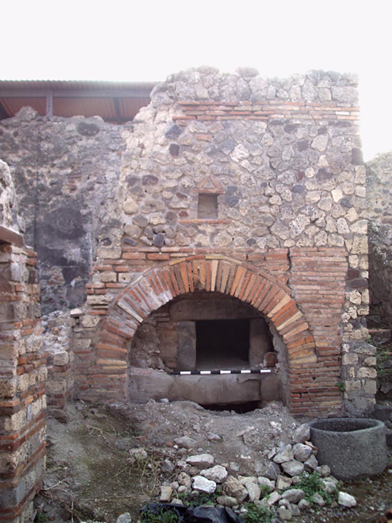 VII.1.36 Pompeii. August 2008.  Looking west towards oven. Photo courtesy of Jared Benton.