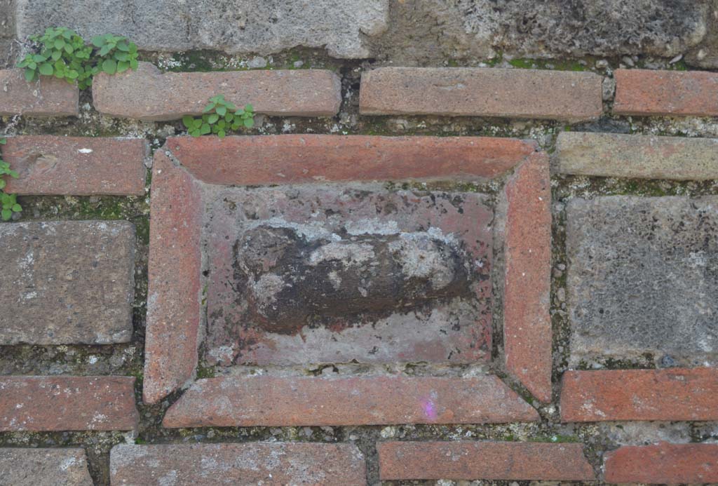VII.3.23 Pompeii, March 2018. Pilaster on north side of doorway with phallus plaque. 
Foto Taylor Lauritsen, ERC Grant 681269 DCOR.
