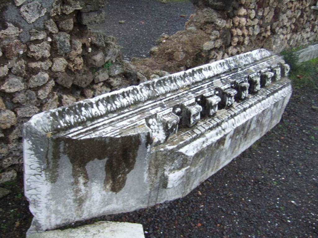 VII.9.1 Pompeii.  December 2005.   Carved marble on ground.

 
