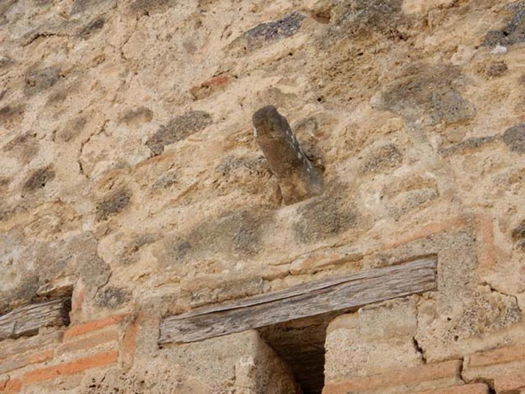 VII.11.12 Pompeii. May 2016. Phallus on outside wall above small window above doorway. Photo courtesy of Buzz Ferebee.
