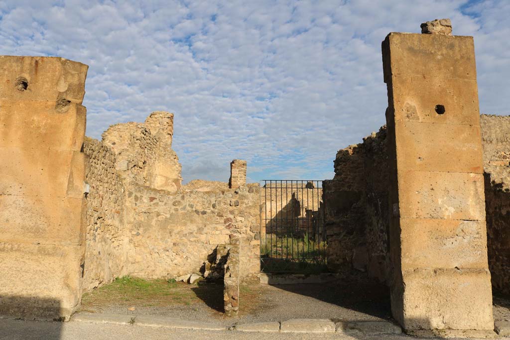 VII.13.2, Pompeii, on left. December 2018. 
Looking north on Via dellAbbondanza, towards entrances, with VII.13.3, centre right. Photo courtesy of Aude Durand.
