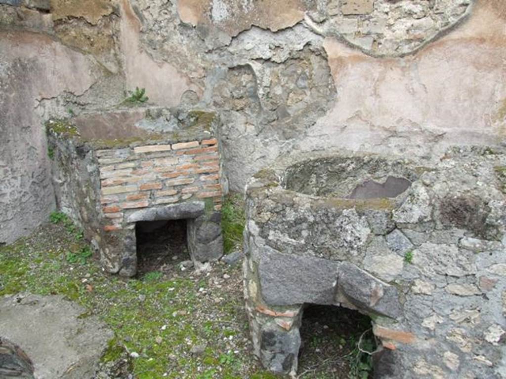 VII.14.5 Pompeii.  March 2009. Room 23.  North west corner.  Hearth and vats with built in oven or hearth.
