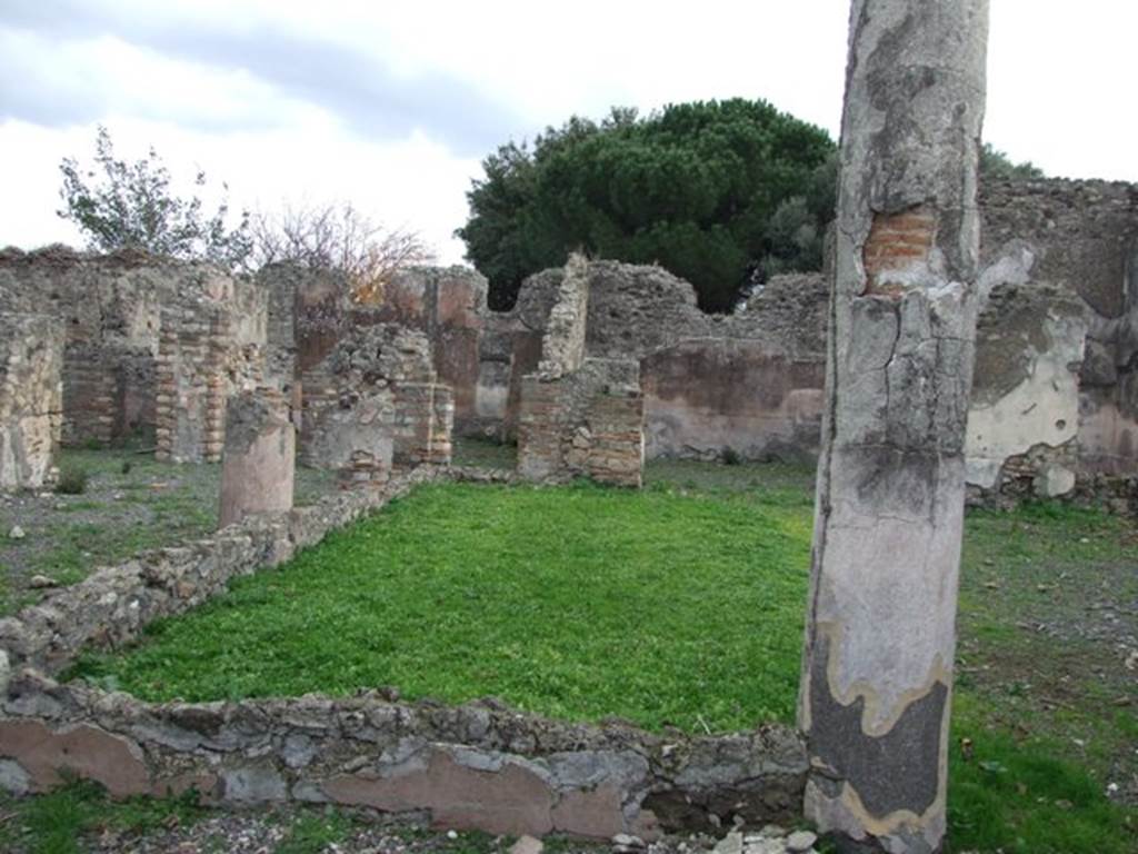 VIII.3.24 Pompeii. December 2007. Looking east across peristyle towards cubiculum, centre left, and tablinum, centre right. 
On the right is a doorway into an oecus, also described as a cubiculum.

