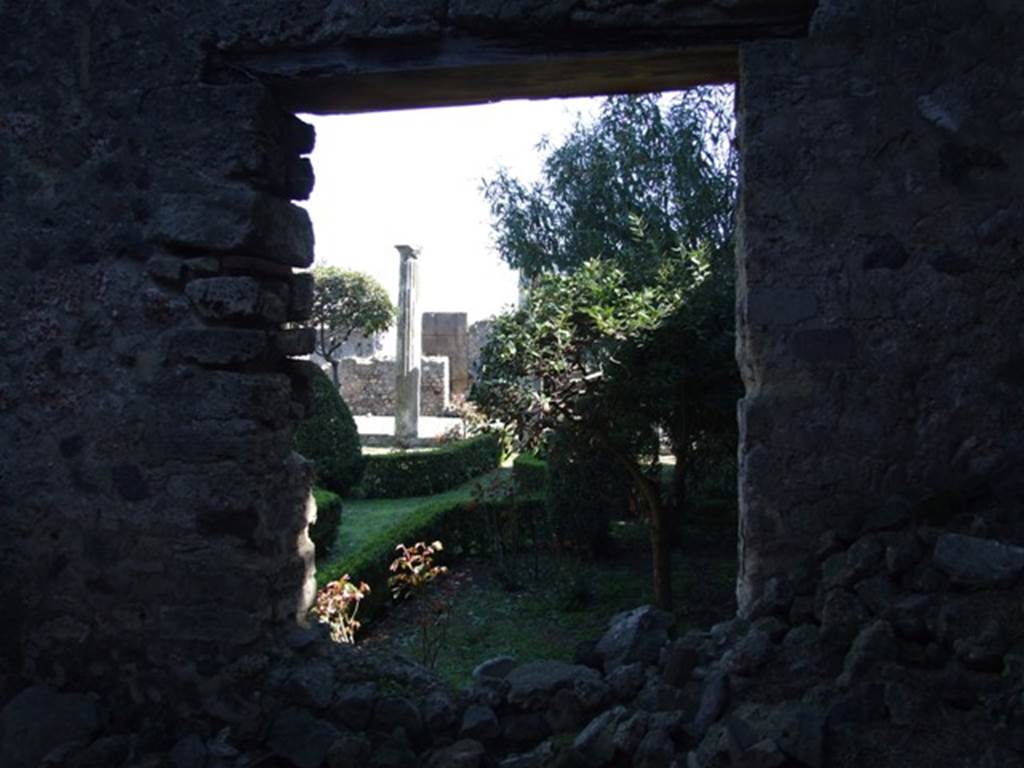 VIII.5.28 Pompeii.  March 2009. Room 12, Oecus.  East wall, with window overlooking Garden area.