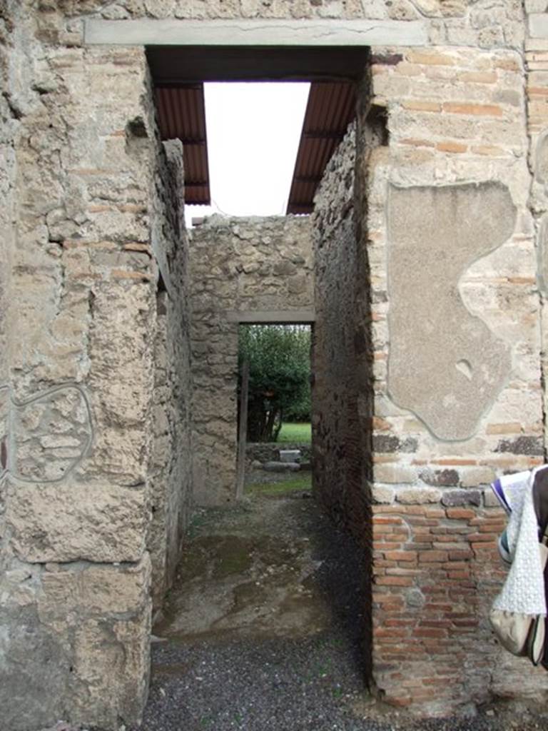 IX.1.20 Pompeii.  December 2007.  Room 11. Passage from atrium to Garden and kitchen area.
