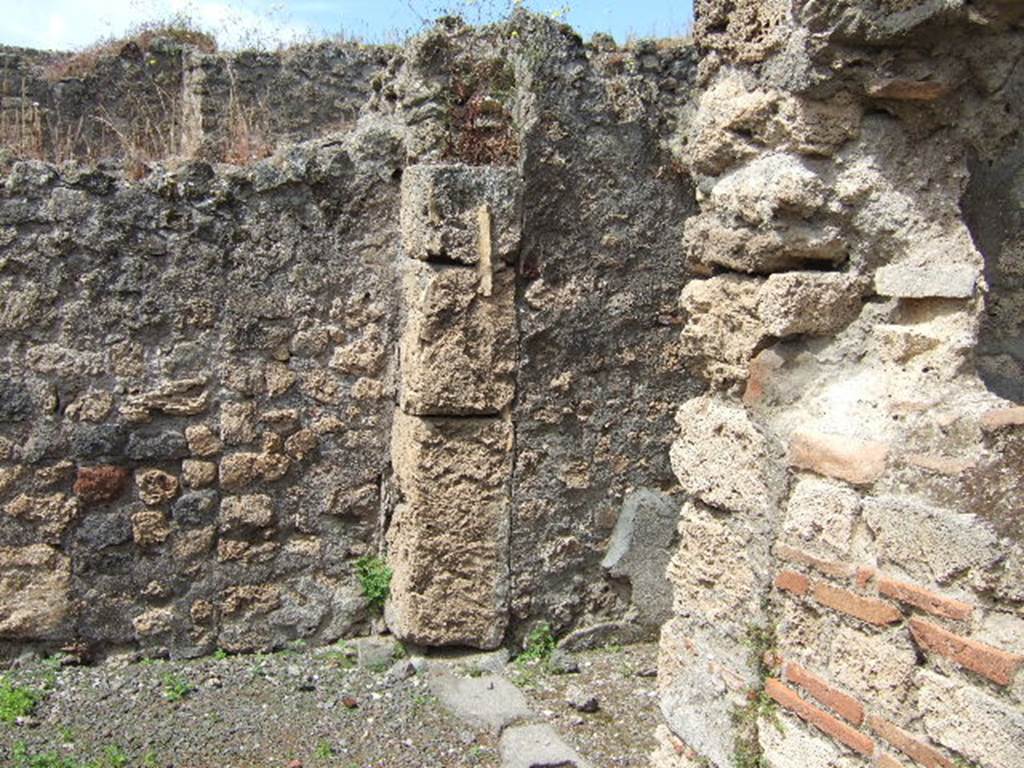 IX.9.6 Pompeii. May 2006. North-west corner of portico, with doorway to corridor leading to front of house.