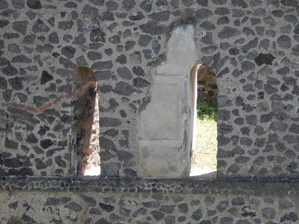 Tower X, Pompeii. May 2015. 
Looking south to detail of lower windows on north side, first floor, at east end. Photo courtesy of Buzz Ferebee. 

