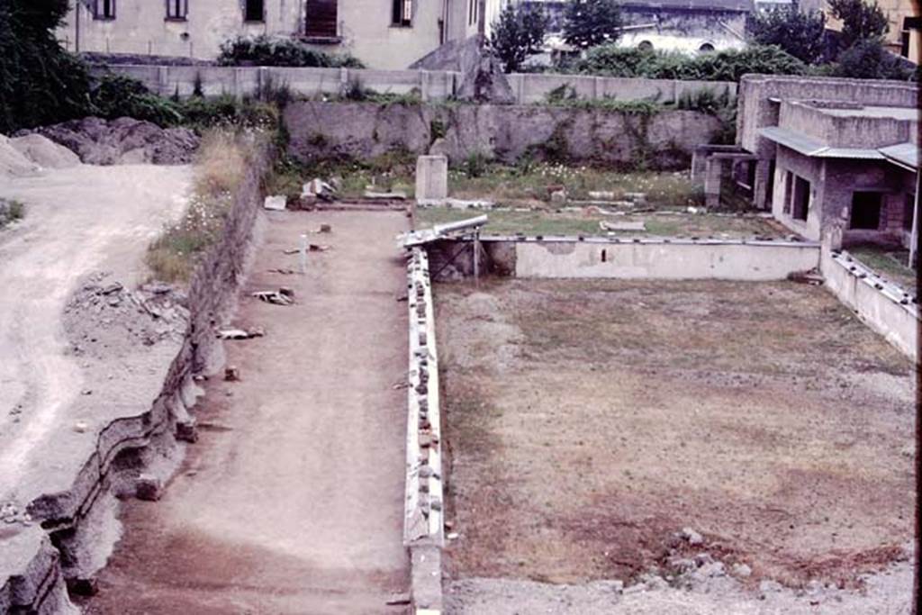 Oplontis Villa of Poppea, c.1984.  Looking south along east side (area 98) of swimming pool 96 towards area 92, the sculpture garden, on its south side. 
Source: The Wilhelmina and Stanley A. Jashemski archive in the University of Maryland Library, Special Collections (See collection page) and made available under the Creative Commons Attribution-Non Commercial License v.4. See Licence and use details.
Oplo0216

