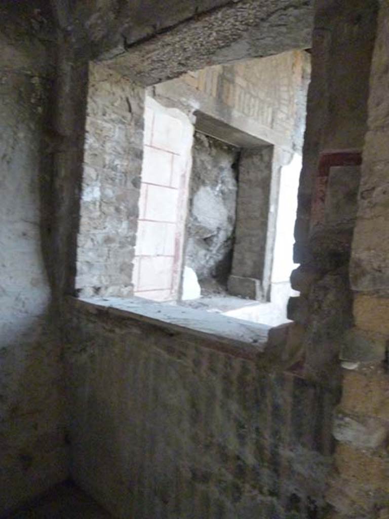 Oplontis, September 2015. Room 97, remains of painted decoration under window in east wall