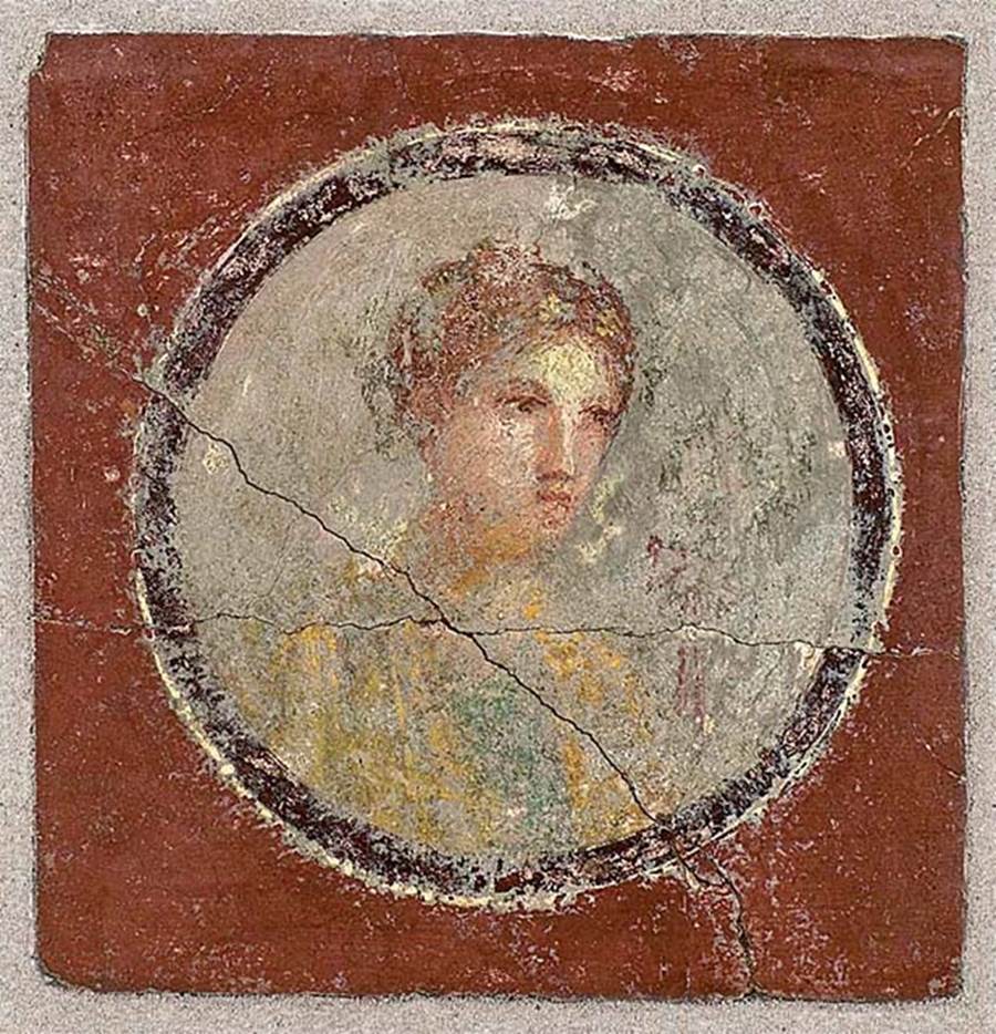 Stabiae, Villa Arianna, room 7, painted medallion of young woman from east end of south wall.
Now in Stabia Antiquarium, inventory number 64825.
A matching medallion of a young man was stolen in 1975 and only recently recovered.
See Camardo D., Ferrara A., Longobardi L., 1989. Stabiae: Le Ville. Castellamare di Stabia, no. 20, p. 31-2.
