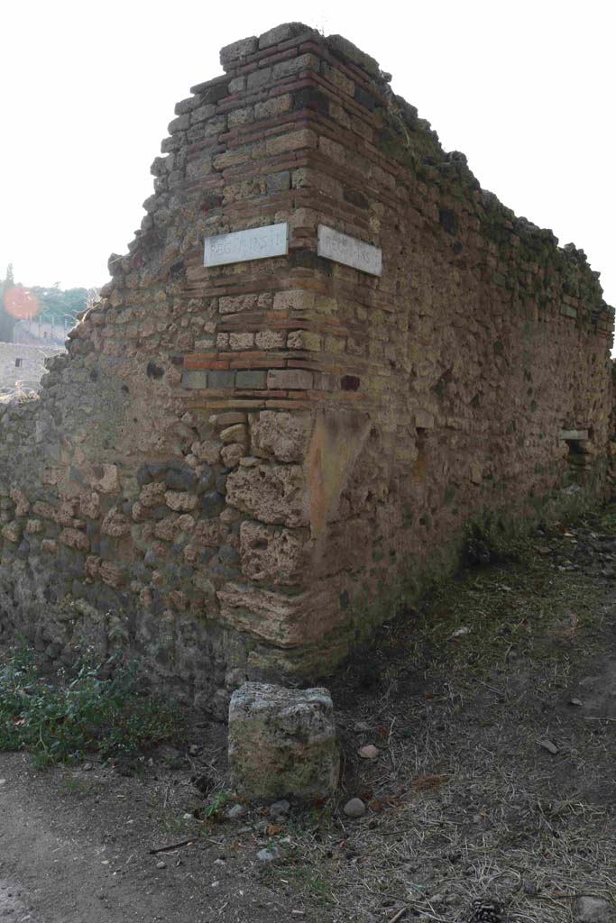 Pompeii, street altar near 1.1.10. September 2018. 
Looking towards site of street altar at south-east corner of insula. Photo courtesy of Aude Durand.