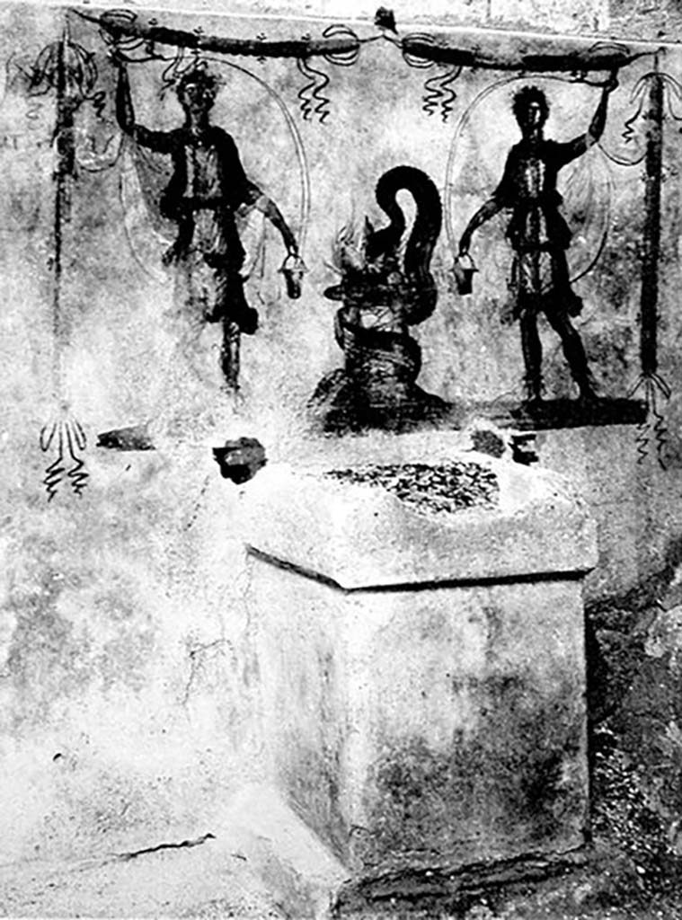 Pompeii, street altar on west side wall of I.11.1. Old photo c. 1915.
Two large Lares were on the sides of a painted altar. 
Each held a cornucopia and a situla (bucket). 
A serpent coiled around the painted altar with its head in the fiery offering.
A garland was above each and one hung down each side.
See Fröhlich, T., 1991. Lararien und Fassadenbilder in den Vesuvstädten. Mainz: von Zabern. (F7, Taf 53,1).