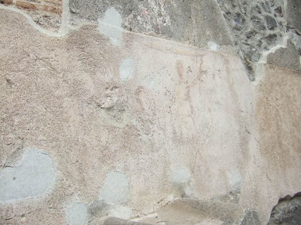 Pompeii, street altar on west side wall of I.11.1, May 2006. Painting above street altar.
Two large Lares were on the sides of a painted altar. 
Each held a cornucopia and a situla (bucket). 
A serpent coiled around the painted altar with its head in the fiery offering.
A garland was above each and one hung down each side.
See Fröhlich, T., 1991. Lararien und Fassadenbilder in den Vesuvstädten. Mainz: von Zabern. (F7, Taf 53,1).