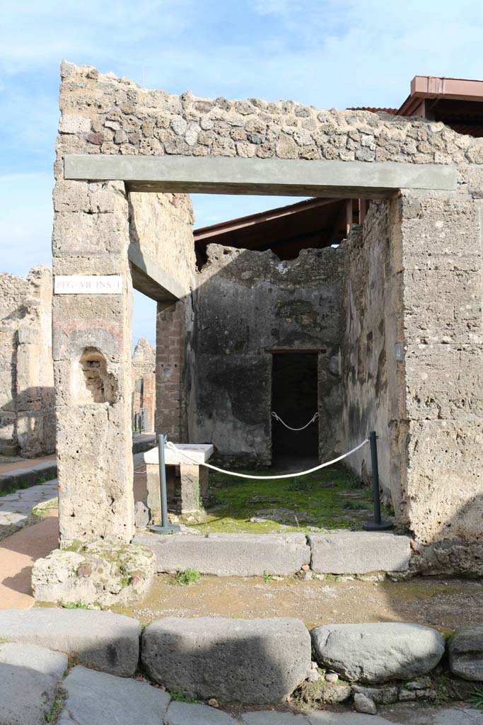 VII.1.42, Pompeii. December 2018. 
Looking east to entrance doorway, with niche for street altar, on left. Photo courtesy of Aude Durand.