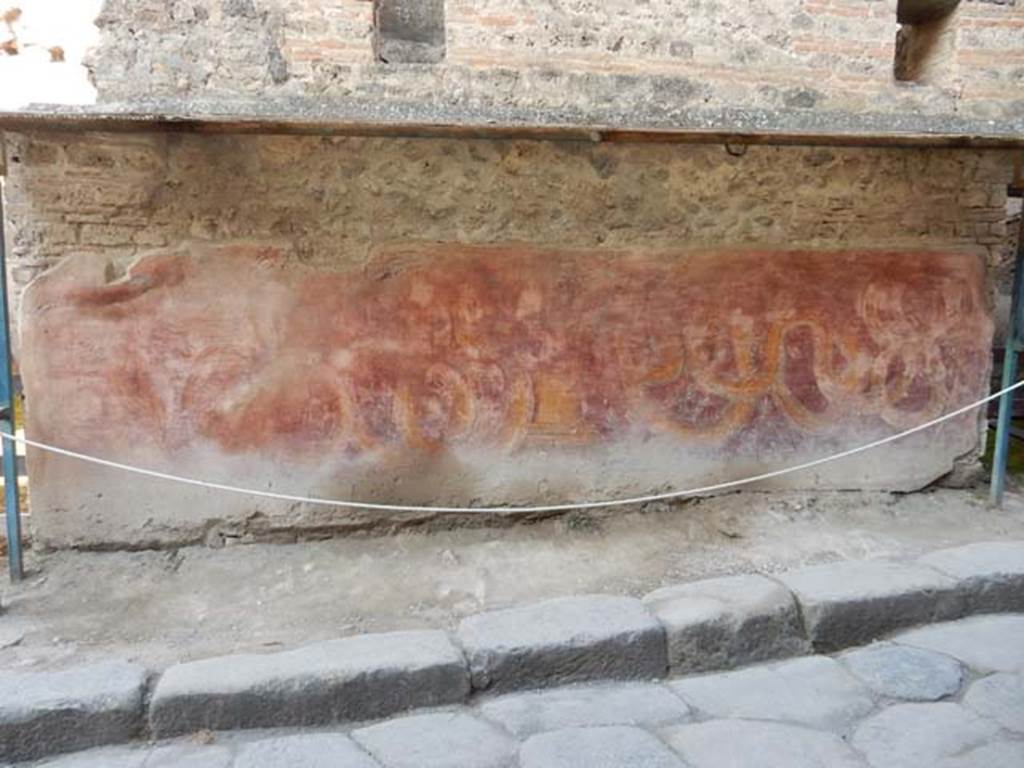 VII.11.13 Pompeii. May 2015. Painted street shrine on outside wall.  Photo courtesy of Buzz Ferebee.