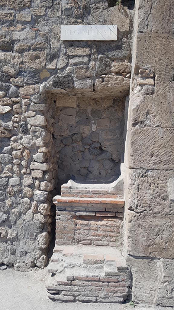 Outside VIII.2.11 Pompeii. August 2023. 
Street altar. Photo courtesy of Maribel Velasco.