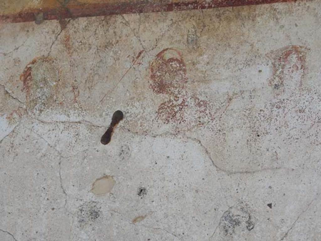 Painted street shrine to twelve gods on corner of insula at VIII.3.11 in May 2015. 
Photo courtesy of Buzz Ferebee.