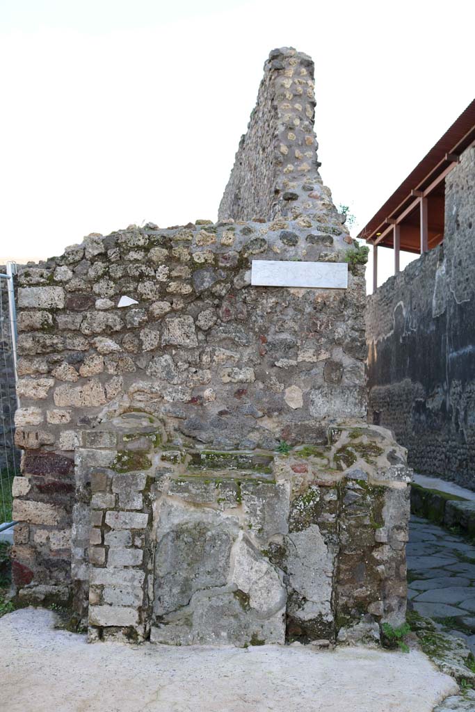 IX.8.1 Pompeii. December 2018. 
Looking south to street altar on Via di Nola. Photo courtesy of Aude Durand.