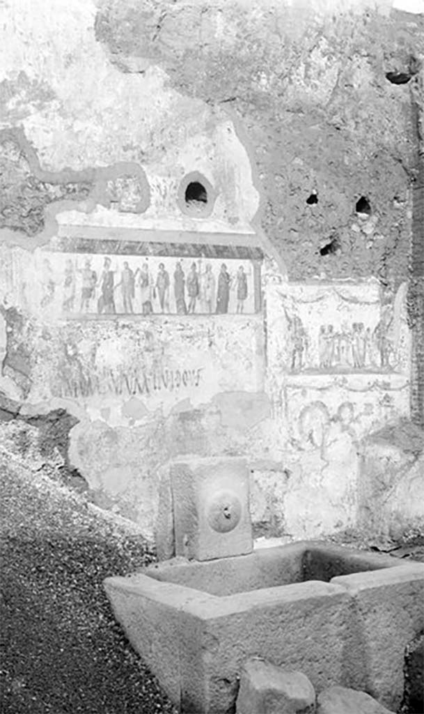 Pompeii street shrine (compitum) to 12 gods outside IX.11.1. 1912.
See The Illustrated London News, 13th April 1912 -552.