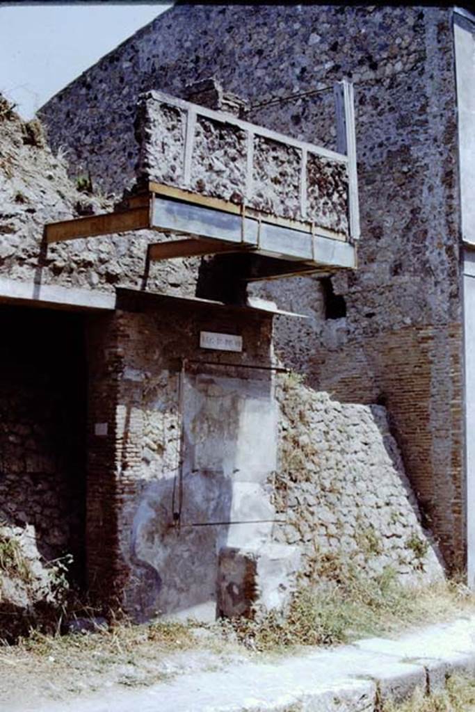 Street altar outside IX.12.7 Pompeii. 1971. Looking north-east on Via dell’Abbondanza.  
Photo by Stanley A. Jashemski.
Source: The Wilhelmina and Stanley A. Jashemski archive in the University of Maryland Library, Special Collections (See collection page) and made available under the Creative Commons Attribution-Non Commercial License v.4. See Licence and use details.
J71f0154