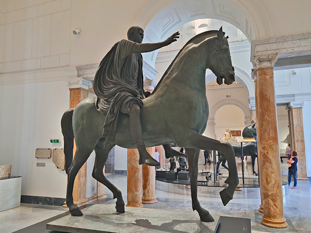Arch of Caligula, Pompeii. April 2023. Equestrian statue found in pieces beneath the arch and rebuilt.
On display in “Campania Romana” gallery in Naples Archaeological Museum.  Photo courtesy of Giuseppe Ciaramella.